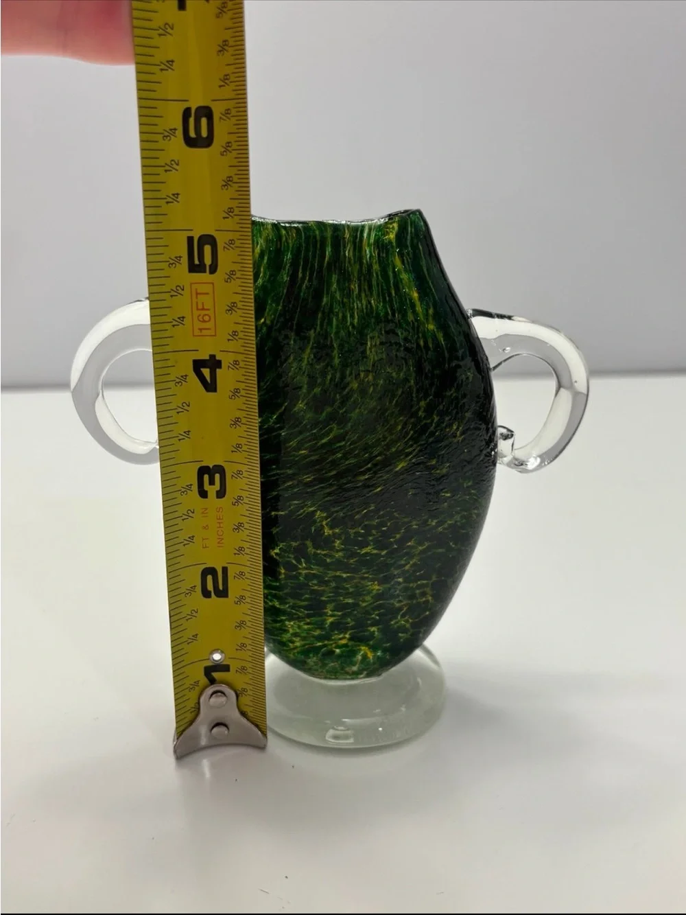 vintage glass vase from Osaka features a dark green, speckled design